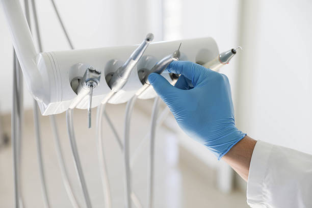 Professional Invisalign Clear Aligners technician working in Manvel, TX